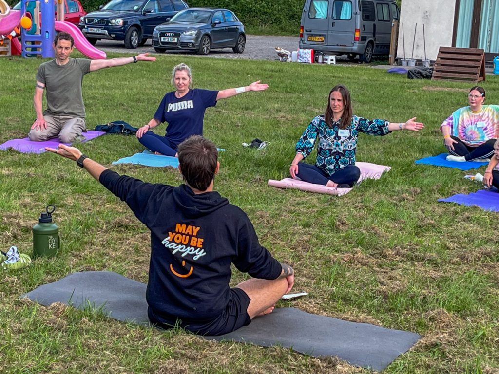 Outdoor yoga on the field