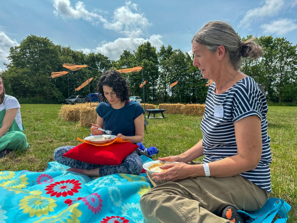 Lunch on picnic blankets in the sunshine