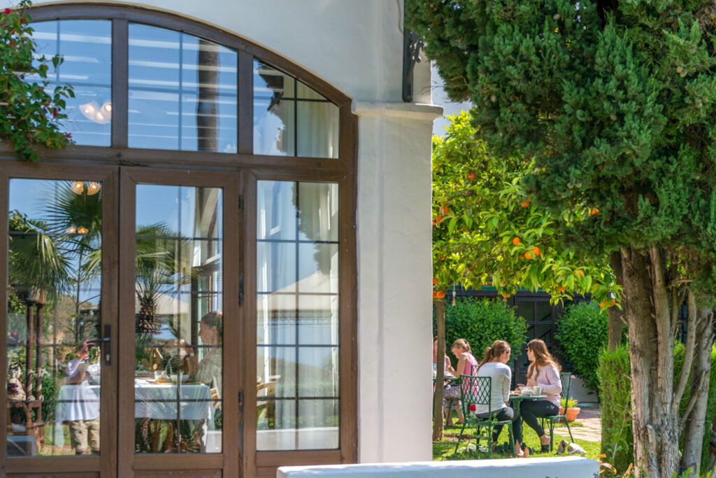 Guests eating on the garden terrace