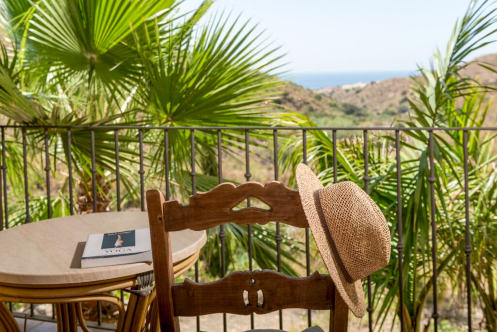 Balcony with table and sea view