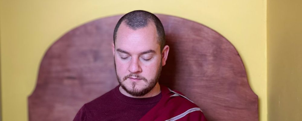 David Oromith doing meditation on retreat